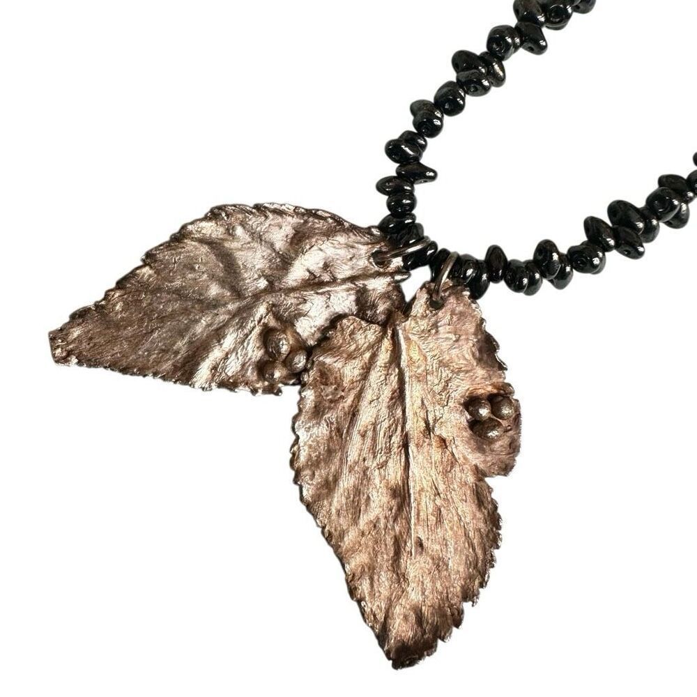 Artisan Hematite Bead Necklace with Electroplated Leaf Pendant - Picture 11 of 13